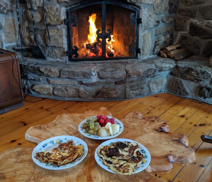 Banana pancakes in front of a fire