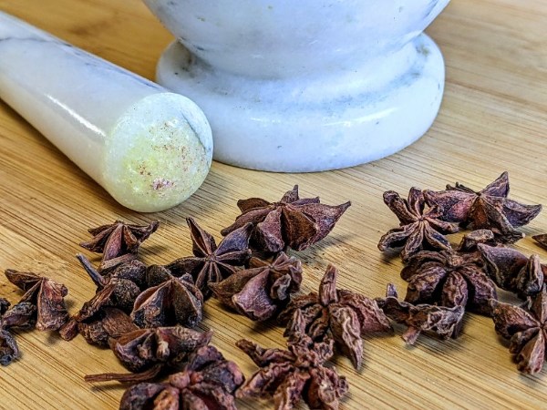 whole-start-anise-by-mortar-and-pestle