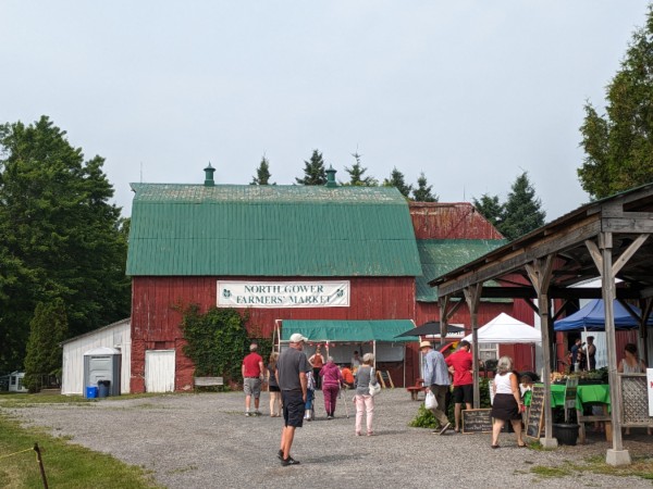 red barn with a green roof